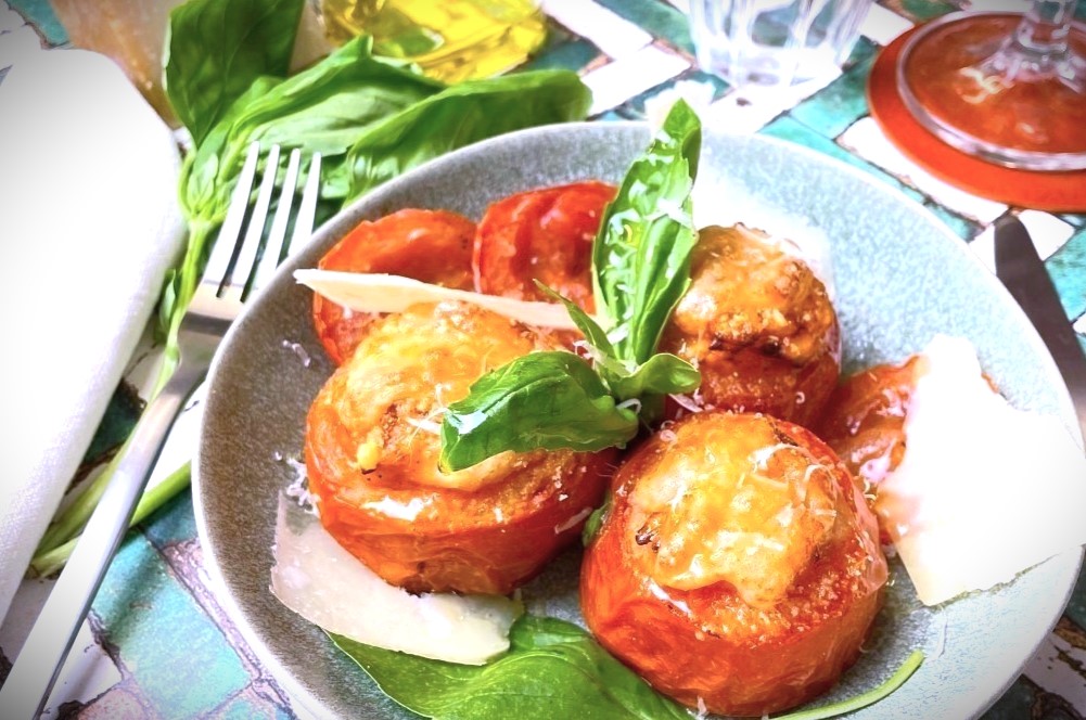 Stuffed Tomato with Rice, Fresh Tomato Sauce, Mozzarella & Basil